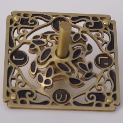 Square Brass Dreidel with Black Flowers, Circles and Hebrew Text